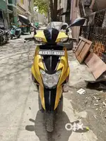 TVS ntorq in yellow colour 1st owner