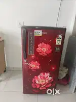 Red coloured Marq refrigerator in warranty period