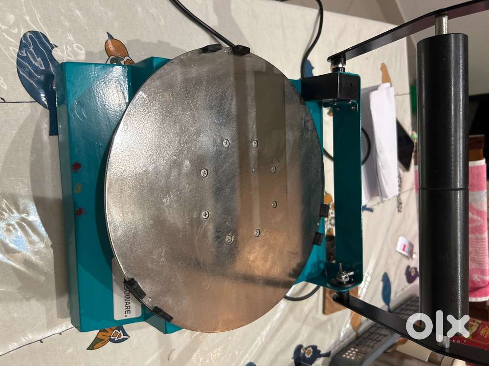 Semi automatic roti roller