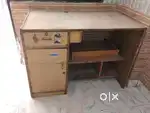 Spacious computer table with cupboard with revolving chair