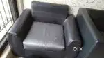 Sofa set n one small shoe rack n a show casen a photo frame