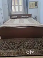 Double size wooden bed