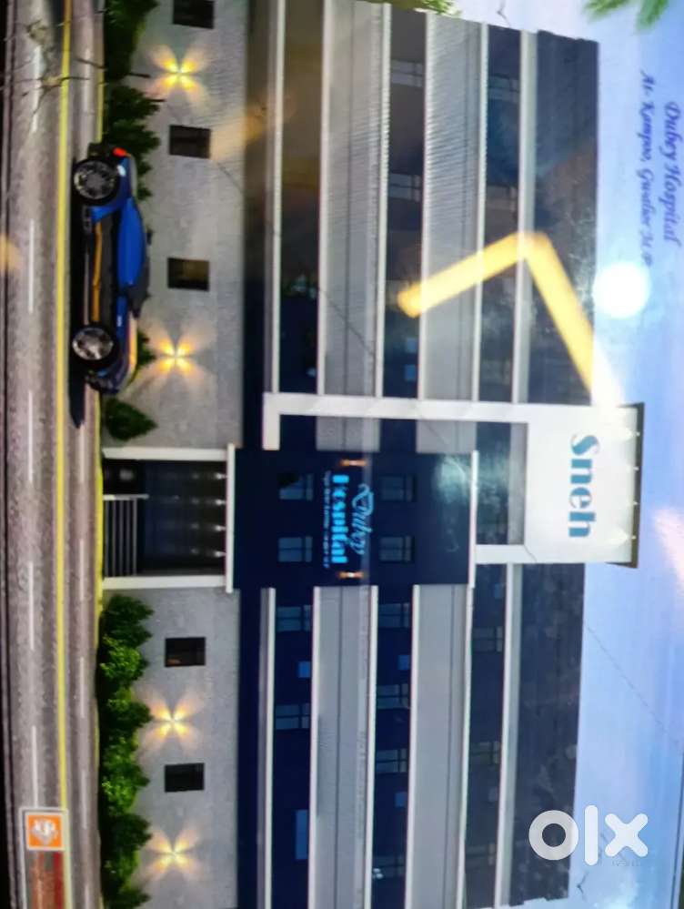 A 3 Story building   in main road for hospital or hotels