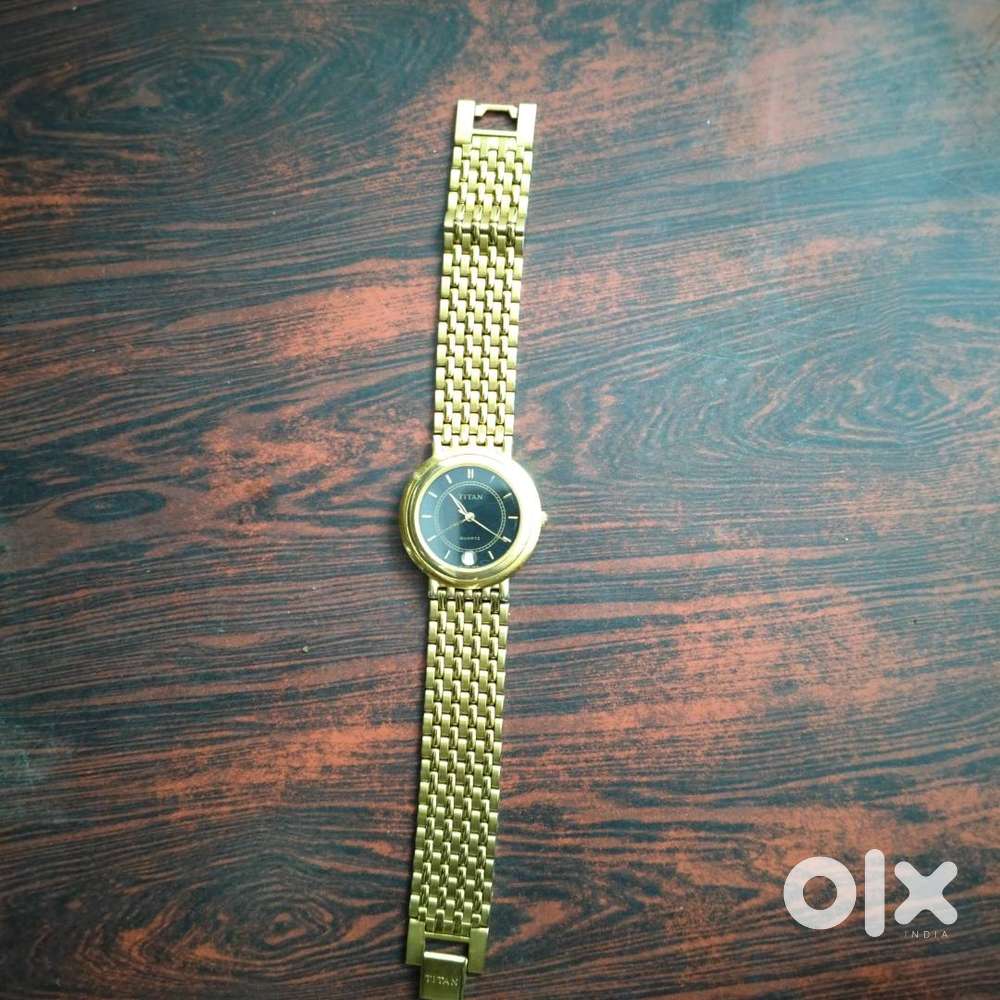 18 carat gold men's titan watch