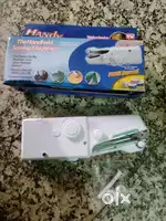 Handheld sewing machine