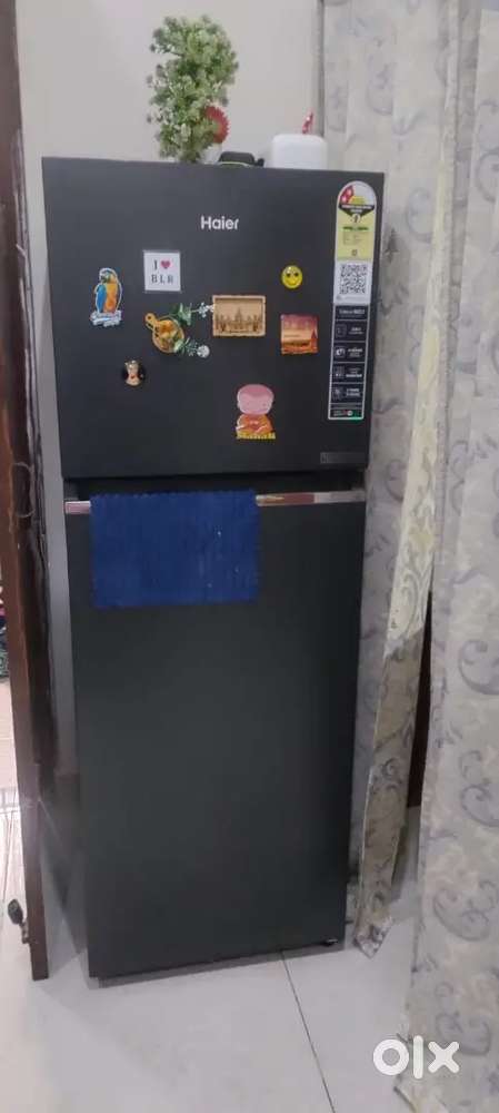Only 2 weeks old HAIER fridge for sale.. We are going abroad...
