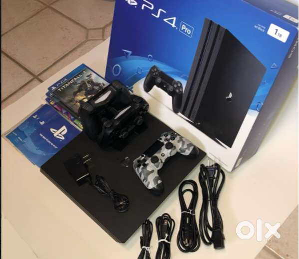 PlayStation 4 Pro 1TB, Original Box, Plus Games And 3 Controllers