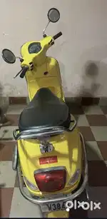 Yellow Vespa 125