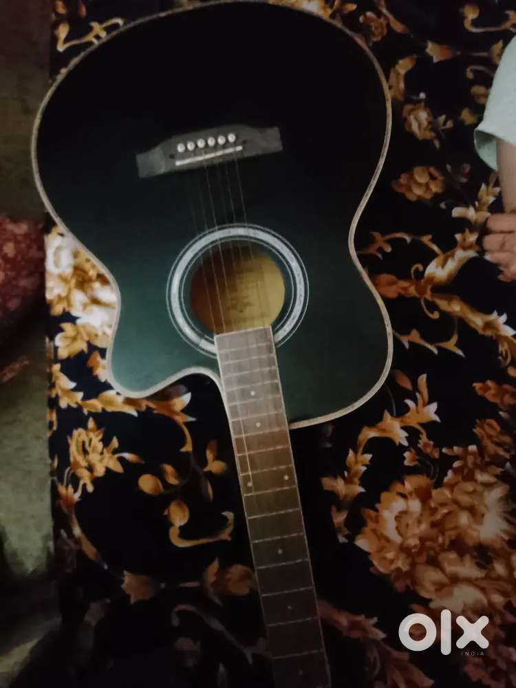 Waxwing branded guitar