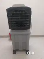 Cooler with speed and water control