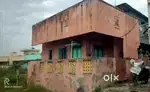 A house with two rooms and a attached bathroom
