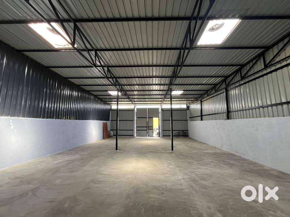 Spacious warehouse cum godown with office washroom & parking .