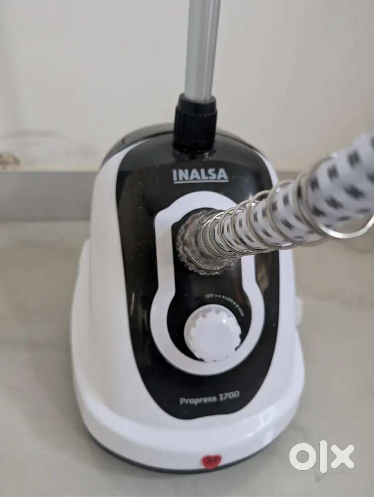 Steam press for clothes