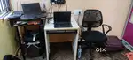Two small computer table and an office chair
