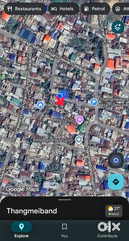 Land with building for sale.