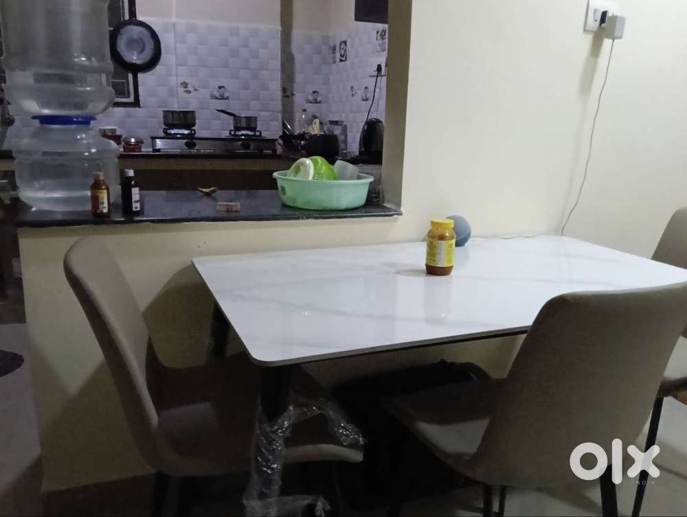 New marble dinning table with four chair wigback