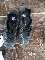 Nivia carbonite football boot with shinguard