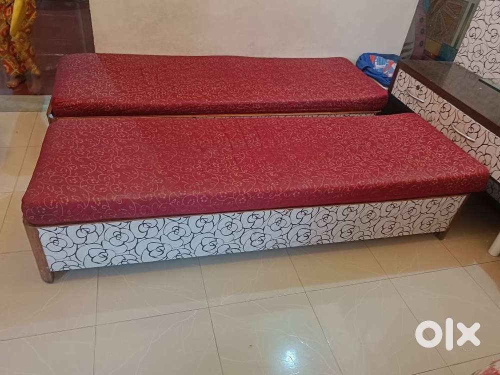 Wooden Storage beds and heavy plastic Cello chairs available