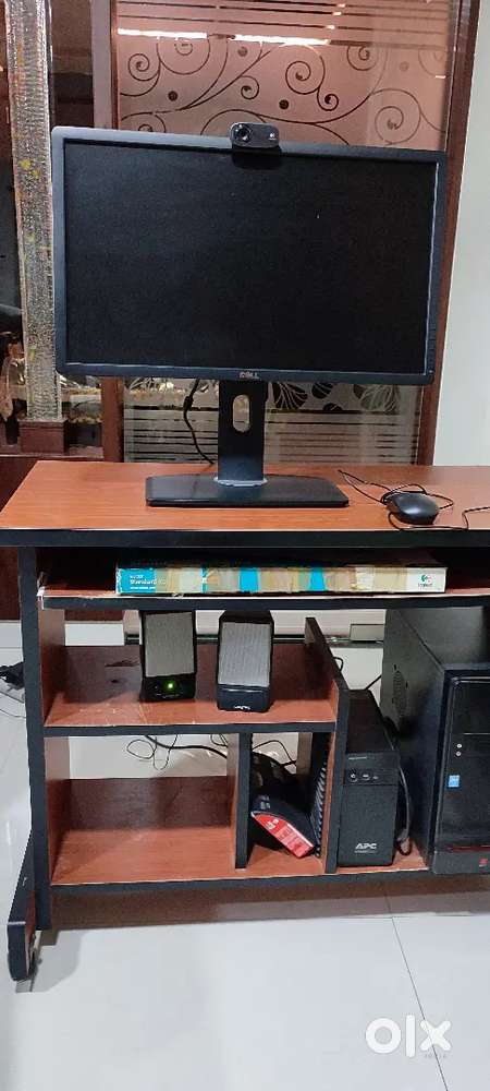 Dell 24 inch monitor along with computer table and  chair