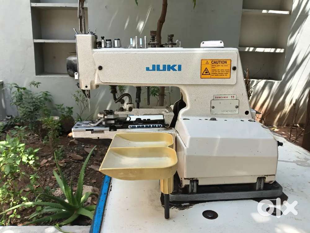 Button setting machine and button hole machine