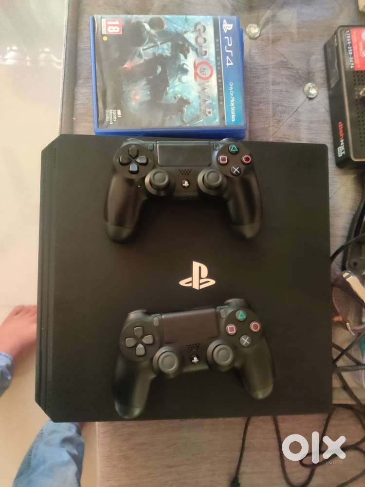 Playstation 4 Pro 1TB with 2 Dualshock 4 Wireless Controllers