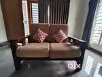 Selling (2+1) seater wooden sofa barely used at low price