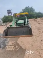 Tector with loder machine