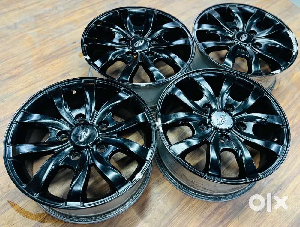 17 inch XUV500 oem black alloys Set of 4 used