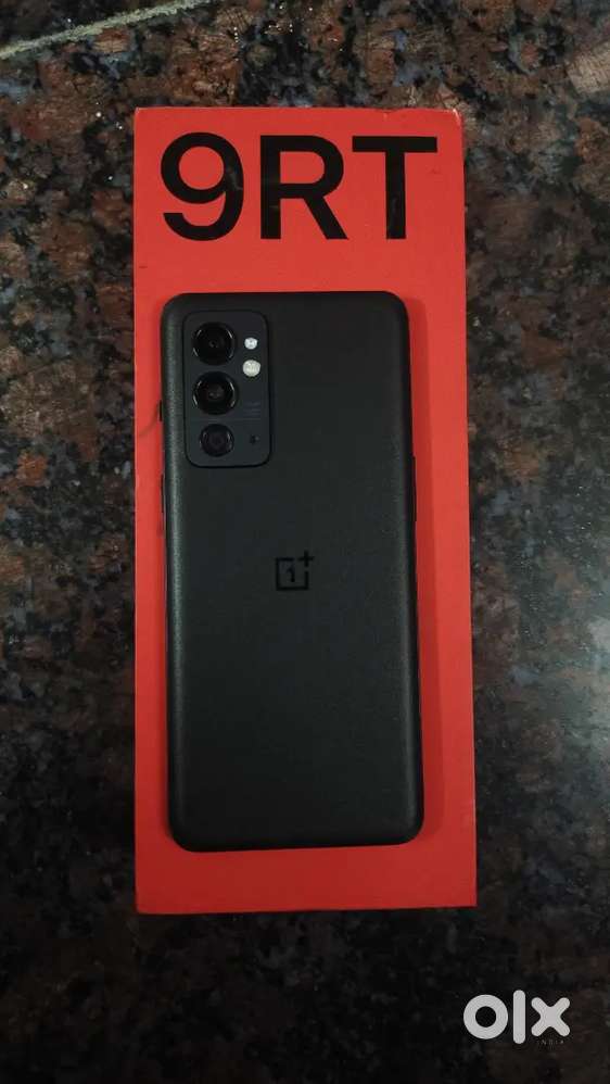 One plus 9RT 8GB 128gb with box and charger original display no repair