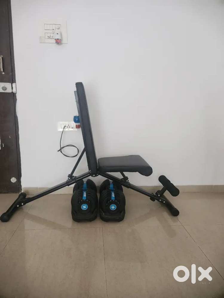 Adjustable dumbell and foldable bench. Less than a year old