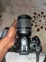 Nikon D3200 + charger and bag and single battery