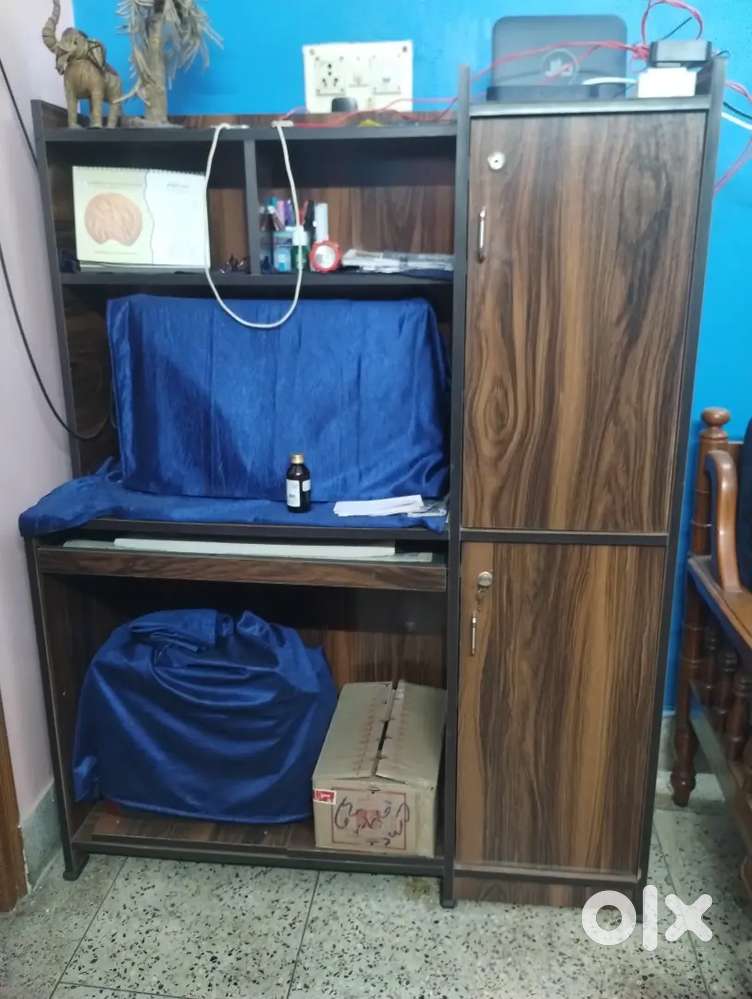 Computer table with a storage capacity