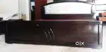 Jai laxmi queen cot with storage made of assam teak and plybod