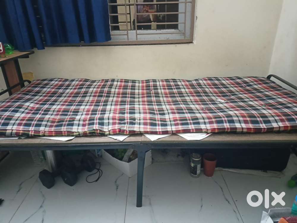 Folding single bed