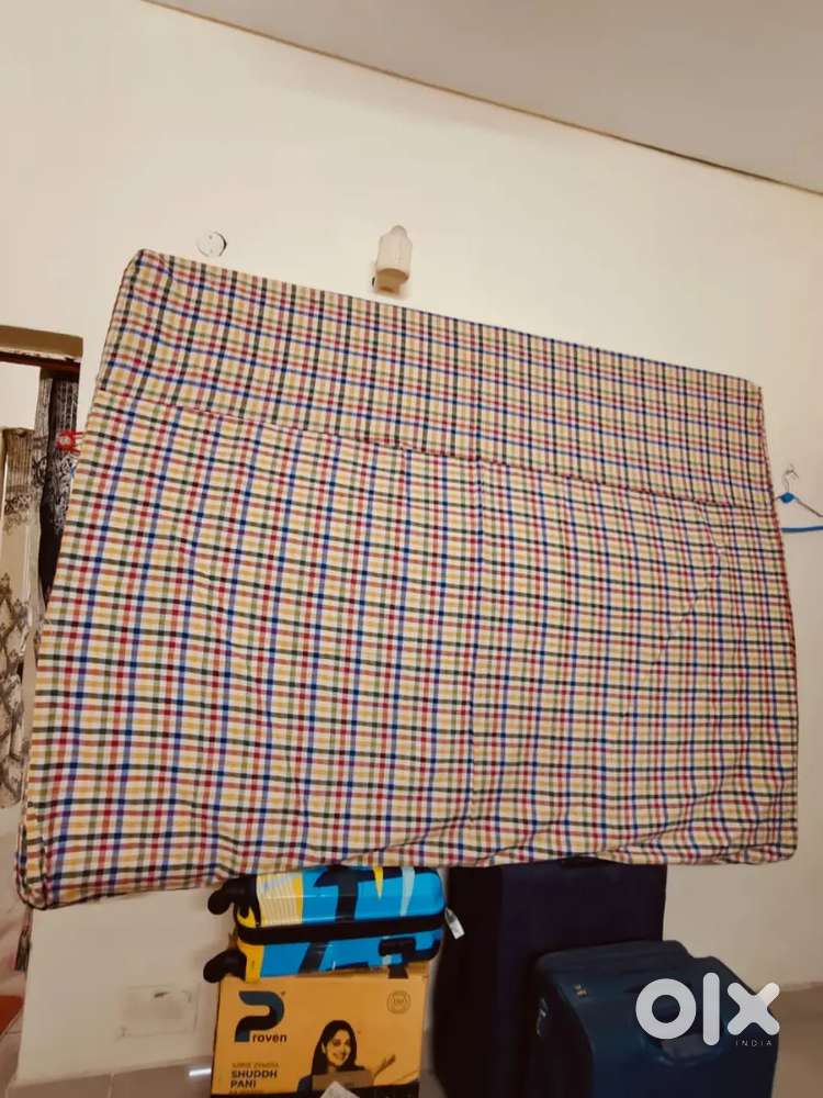 Plastic dining table and queen bed mattress