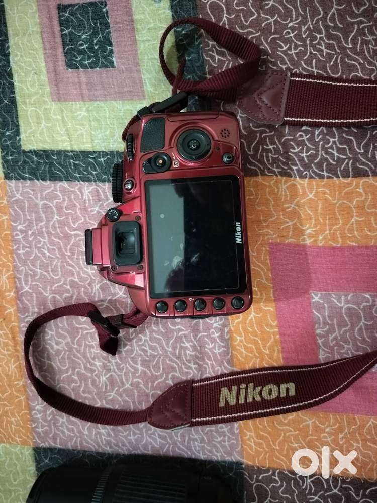 Nikon D3100 DSLR with 2 lens, lens hood and Cam Bag