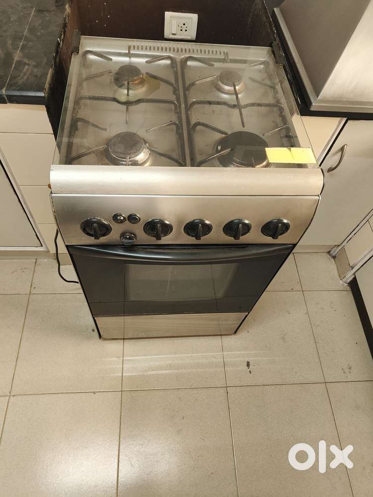 Faber 4 burner cooking range with chimney