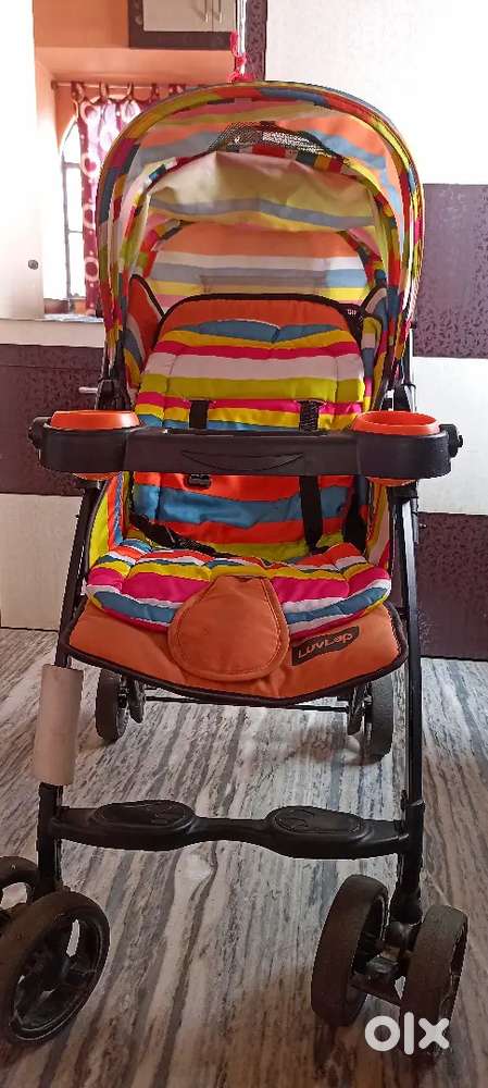 Selling luvlap baby stoller (with some free items) and coffee table.