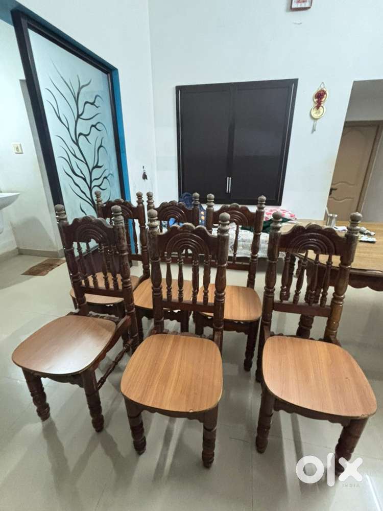 6 Wooden chairs (negotiable)
