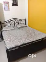Metal bed with storage space with mattress