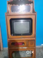 LG tv with wooden tv trolley