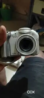 CanonPowerShotS1 IS 3.2 MP Digital&Canon Sure Shot 76 Zoom 35mm PointS