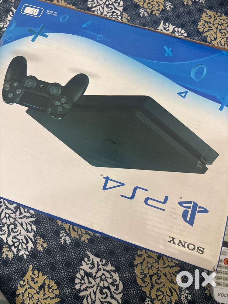 Sony PS4 with games (with 2 game remote)
