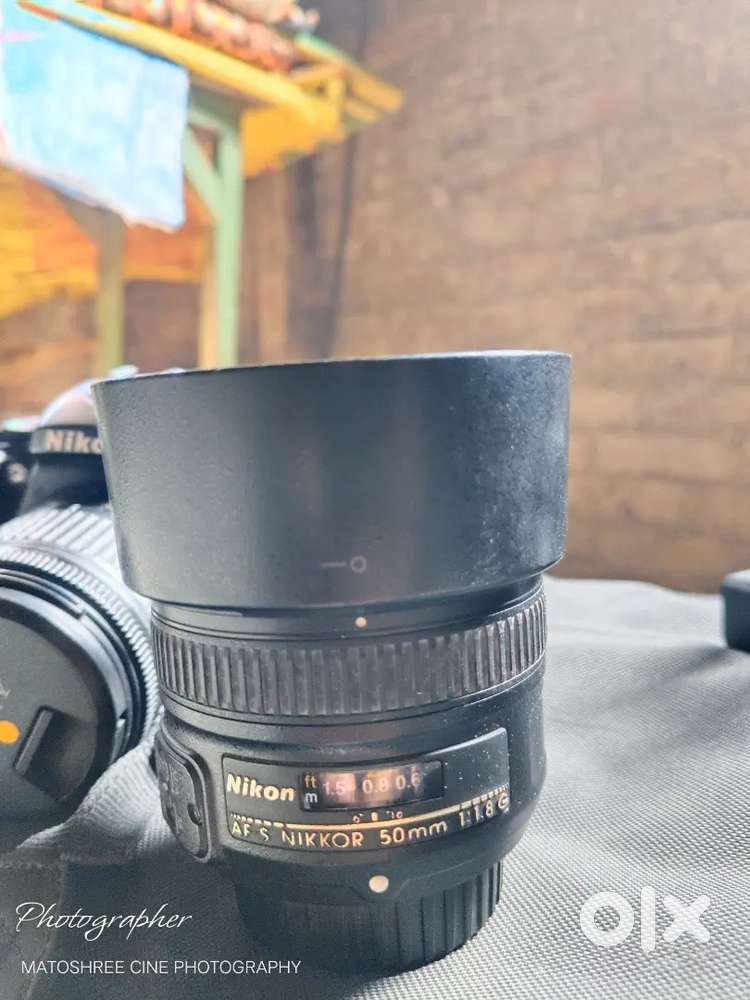 Nikon D5600 model plus 50mm lens 1.8 aperture