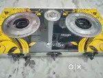 3-burner automatic gas stove with a glass top.