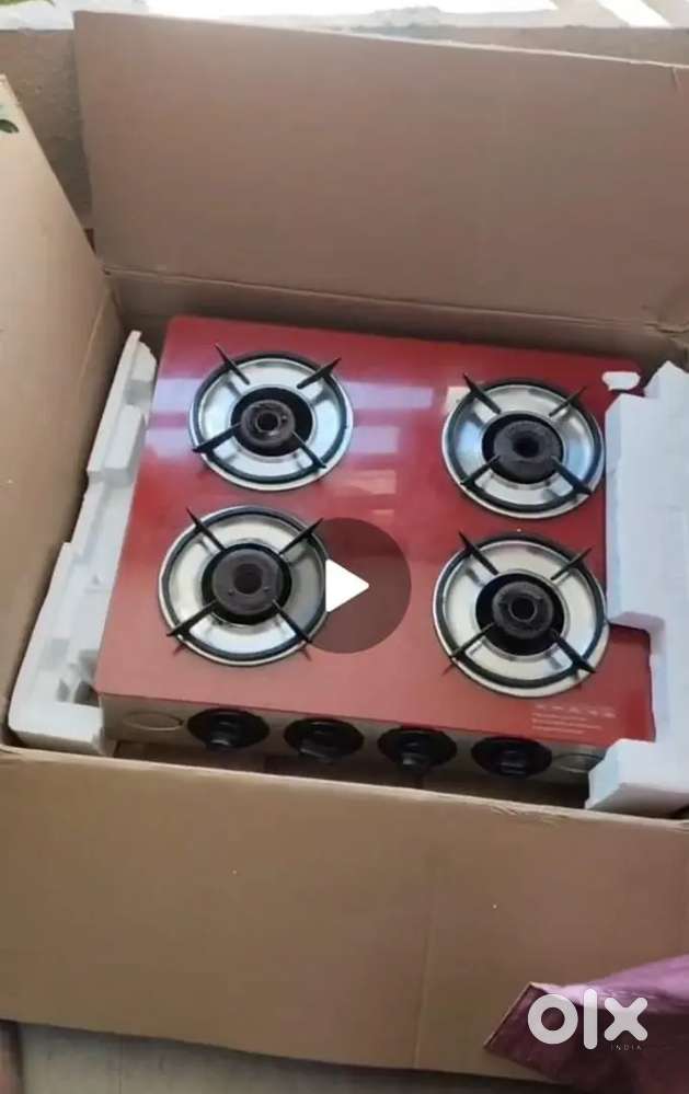 4 burner gas stove in excellent condition selling as m shifting abroad