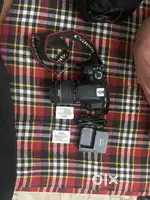 Canon EOS 650D DSLR Camera 2 battery charger and bag