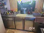 Steel counter with deep Fridge and basin