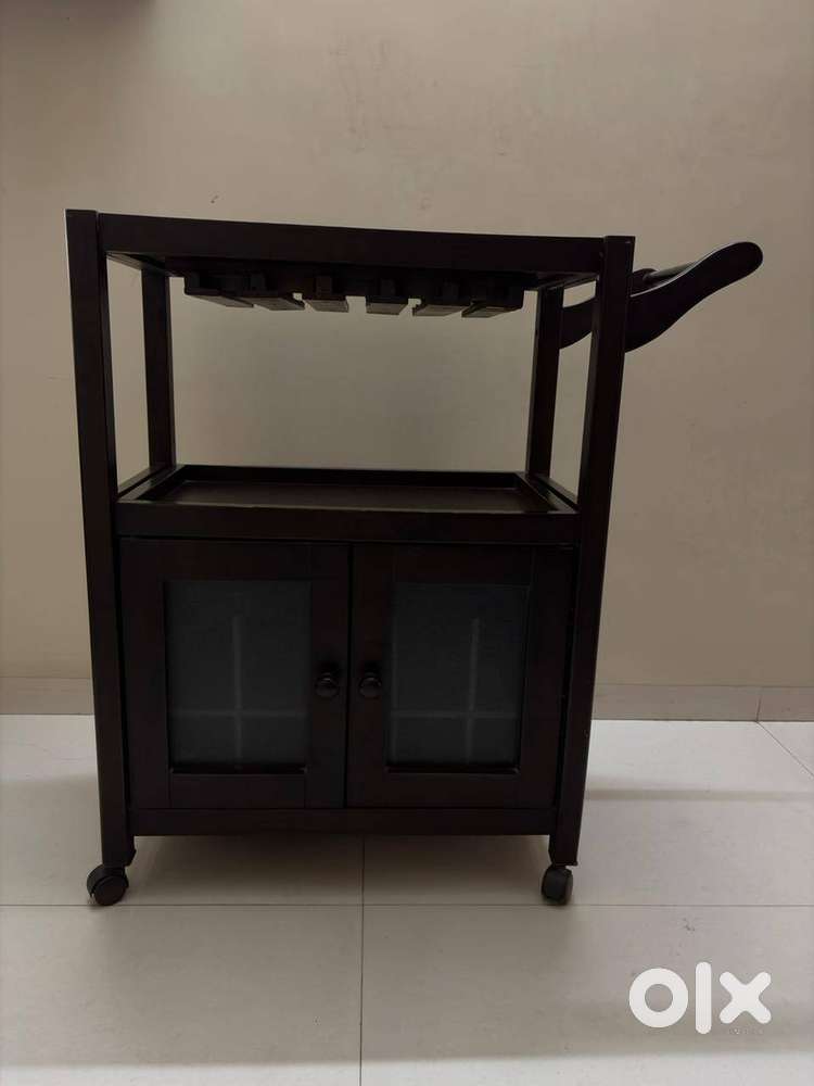 Bar unit with wine glass rack and bottle cellar