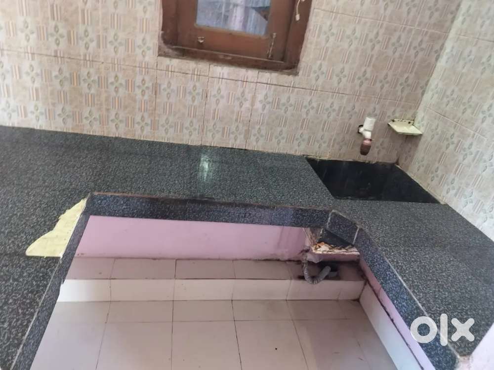 Independent tiles floor 1bhk house at sixmile panjabari main road.